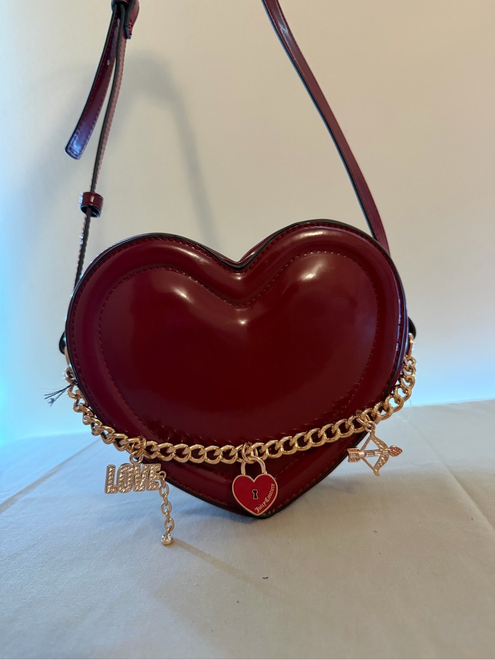 Heart-Shaped Crossbody Bag in Burgundy with Gold Charm Chain